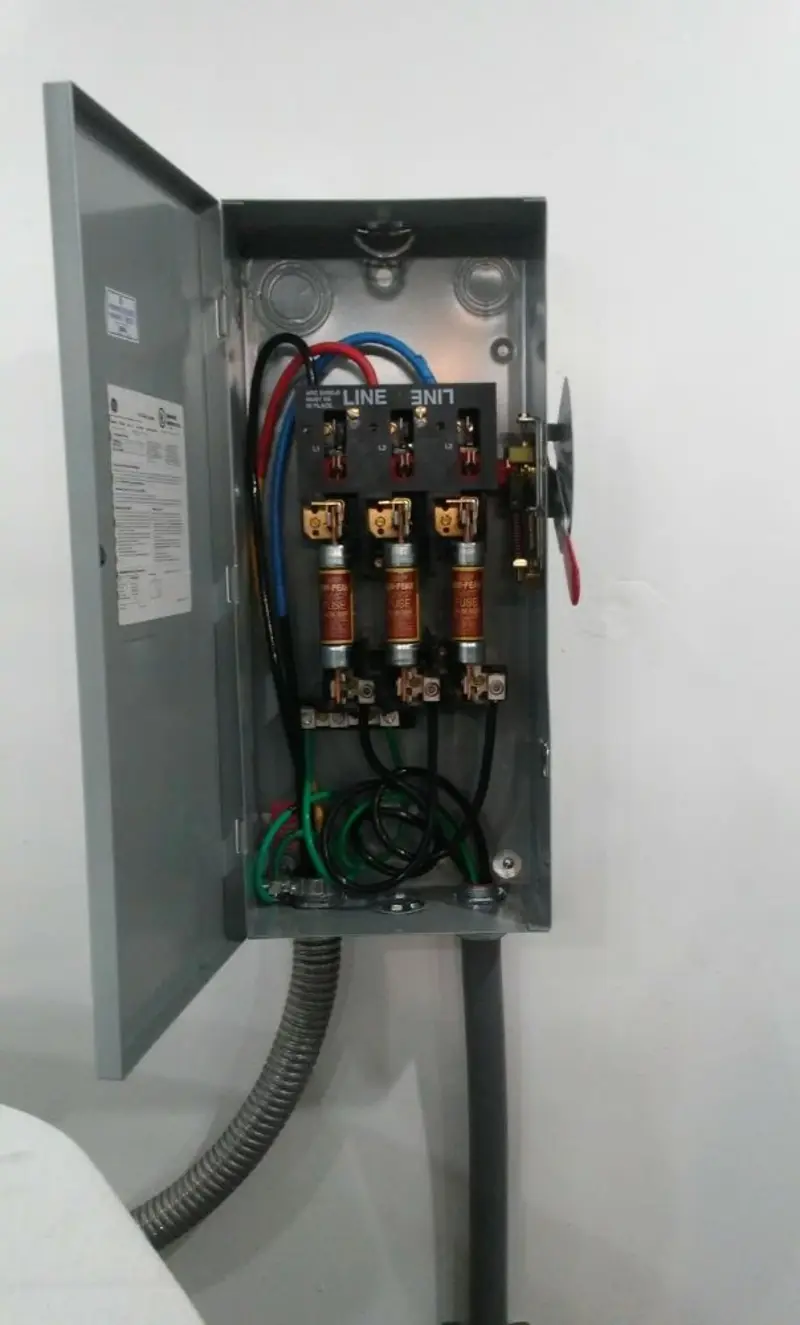 Three-phase disconnect switch installed for Smoke Detector Installation in Palm Beach Gardens